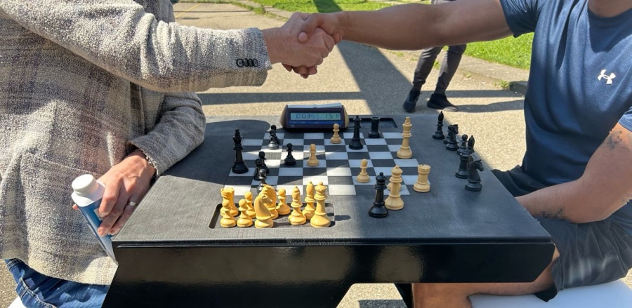 Chess tables in the prison yard of Alphen: A strategic move