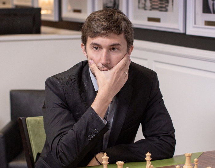 World chess champion Anatoly Karpov center with his mother Nina